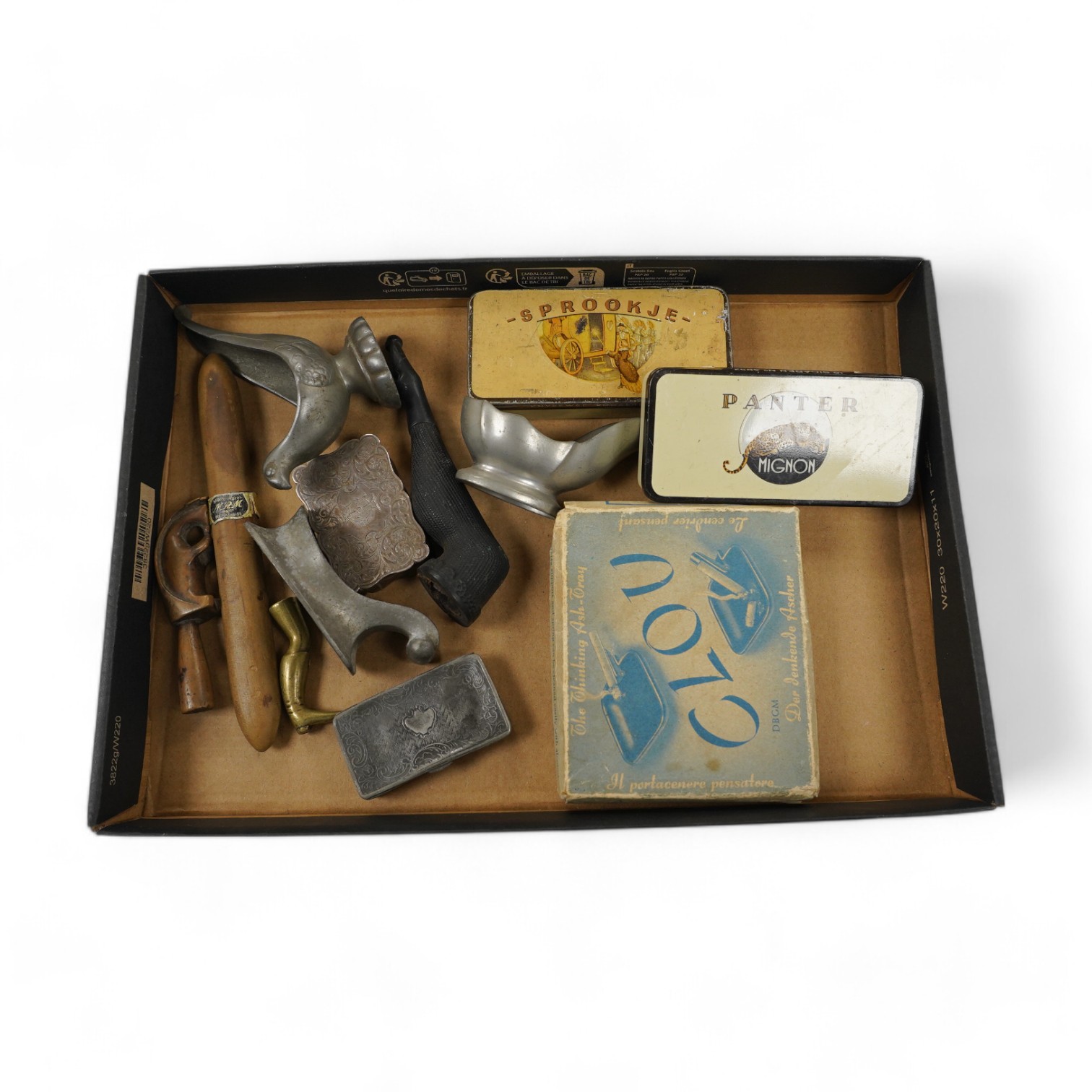 Sundry smoking related curios, including a pipe, pipe stands, match boxes, an ashtray, etc. Condition - fair